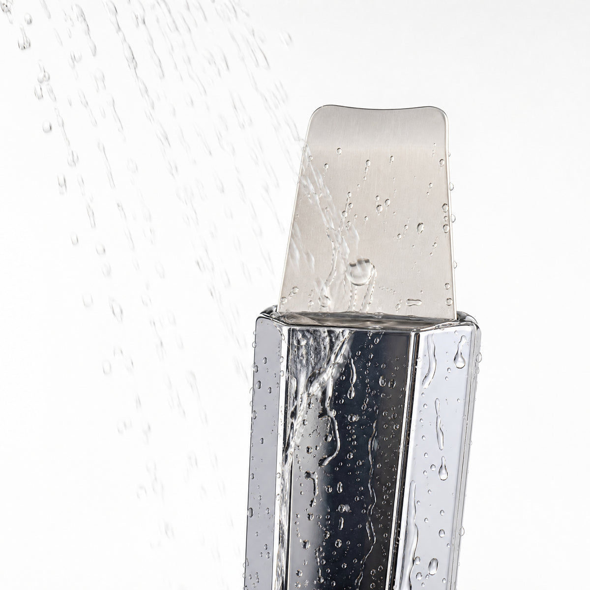 Nuvia ultrasonic skin spatula blade prepared for wet-skin cleansing